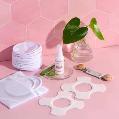NuNi Stilleinlagen, Stillpads, Reinigungsspray und Stillclip in grau