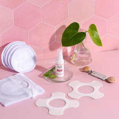 NuNi Stilleinlagen, Stillpads, Reinigungsspray und Stillclip in grau